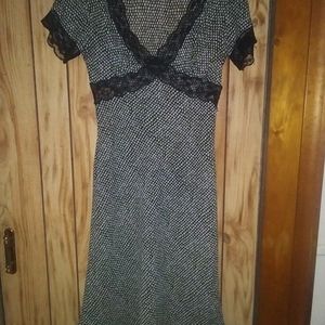 Pretty black lace edged dress with pattern